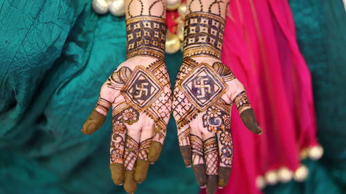 Close-up of woman hand with umbrella