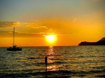 Scenic view of sea against sky during sunset