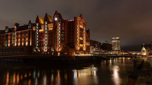 Maritimes museum speicherstadt at night illuminated with red bricks from old storehouses