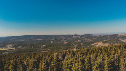 Scenic view of landscape against clear blue sky