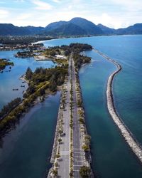 High angle view of bay in lake against sky