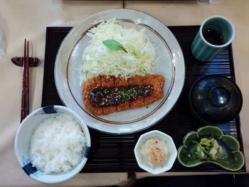 Close-up of served food in plate