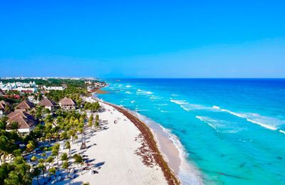 Scenic view of sea against clear blue sky