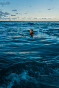 Man swimming in sea