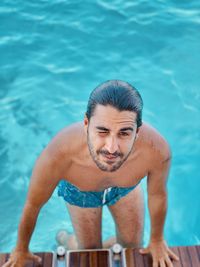 High angle view of man swimming in pool