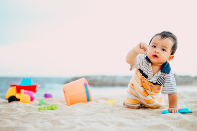Portrait of cute boy on beach