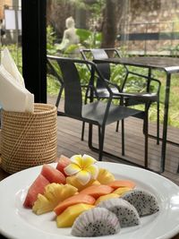 Close-up of fruits in basket on table