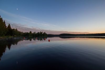 View of lake against sky during sunset