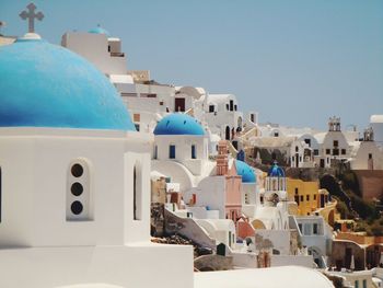 Houses against clear sky