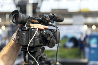 Filming media event, news or press conference with a television camera