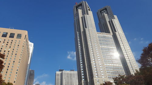 Modern buildings against blue sky