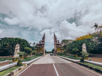 Panoramic view of road against cloudy sky