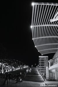 Illuminated street lights at night