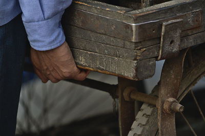 High angle view of man standing on metal