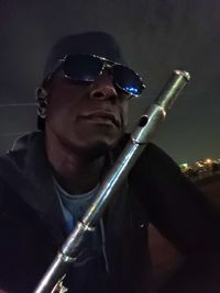 Portrait of young man wearing sunglasses