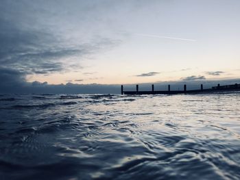 Ripples in the sea with a melancholy evening sky 