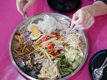 Midsection of woman holding food
