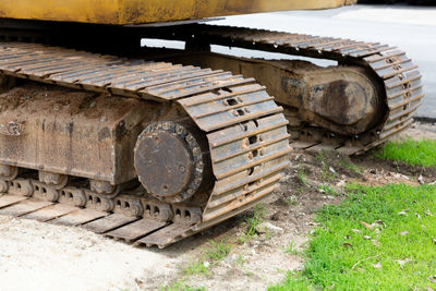 Old rusty railroad track amidst field