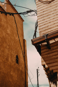 Low angle view of house against sky