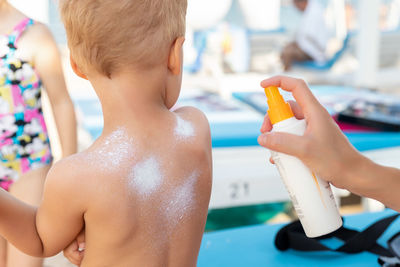 Close-up of boy playing with toy