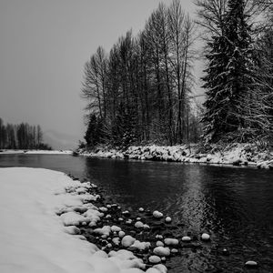 Scenic view of frozen lake against sky