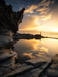 Scenic view of sea against sky during sunset