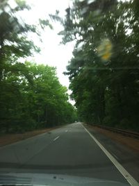 Road seen through car windshield