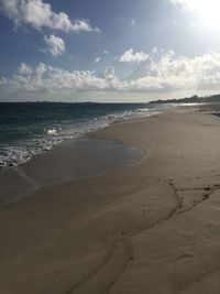Scenic view of beach against sky