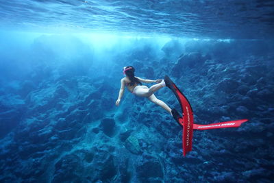 Man swimming in sea