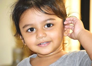 Portrait of cute girl smiling