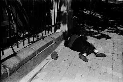 High angle view of woman walking on street