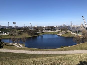 Scenic view of lake against clear blue sky