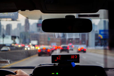 Road signal seen through car windshield