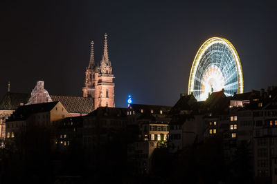 Low angle view of illuminated building at night