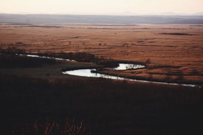 Scenic view of river against sky