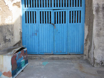 Blue closed door of old building