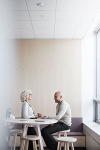 Business people talking during coffee break