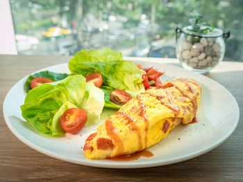 Close-up of breakfast served on table