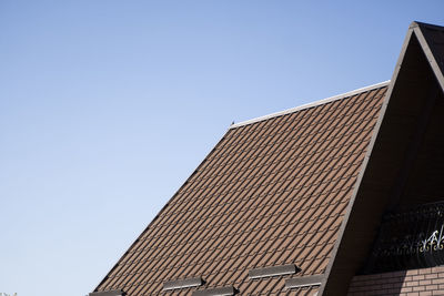 Low angle view of building against blue sky