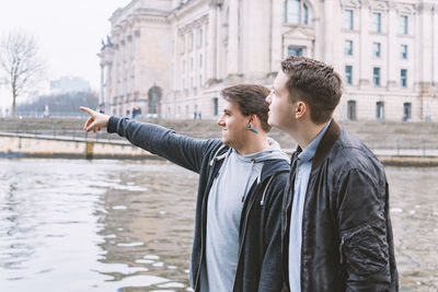 Young couple standing in city