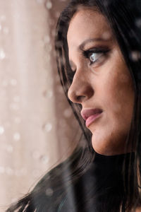 Portrait of beautiful woman looking away