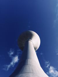 Low angle view of communications tower against sky