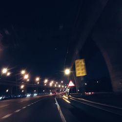 Cars on road at night