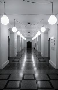 Illuminated corridor of building