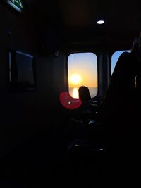 People in illuminated bus