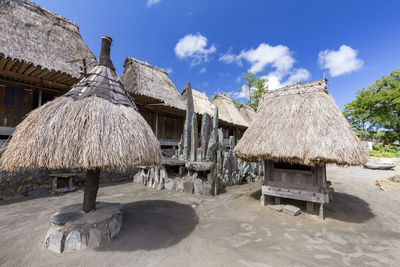 Built structure on beach against sky