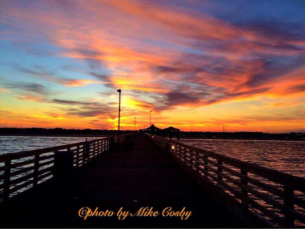 PIER ON SEA AT SUNSET