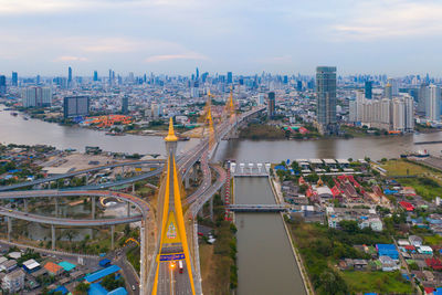 High angle view of city buildings against sky