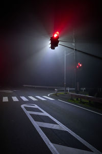 High angle view of illuminated street at night