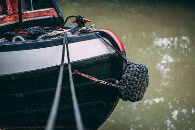 Close-up of fishing boat sailing in sea